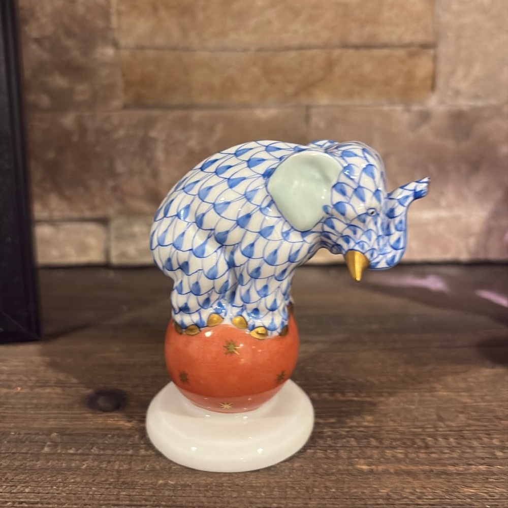 Herend .  beautiful elephant on ball.  Excellent brand new condition. Perfect